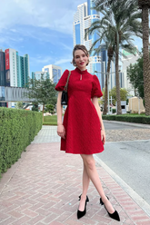 a lady in a red dress